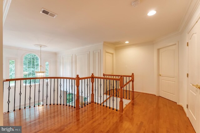 1296 Newkirk Ct, Vienna, VA 22182 - corridor with an upstairs landing, crown molding, wood finished floors, and recessed lighting
