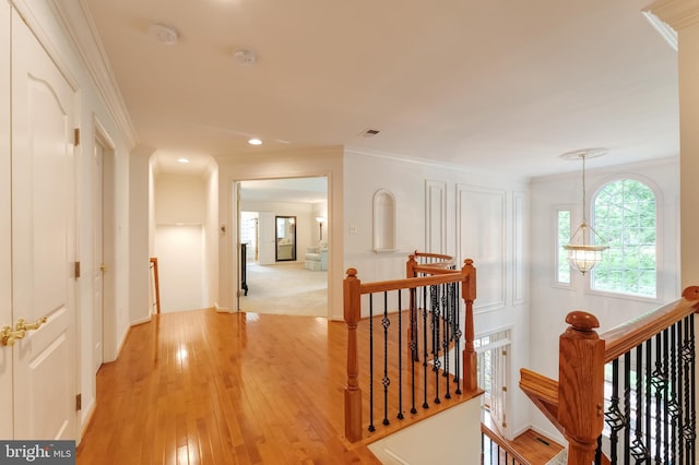 1296 Newkirk Ct, Vienna, VA 22182 - corridor featuring an upstairs landing, ornamental molding, light wood-style flooring, and recessed lighting