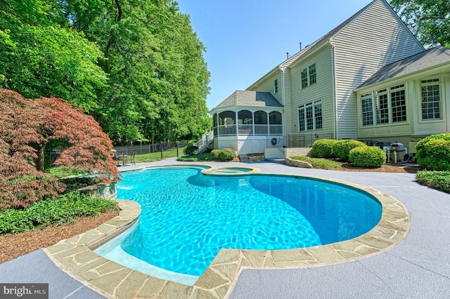 1296 Newkirk Ct, Vienna, VA 22182 - view of pool featuring a sunroom and a pool with connected hot tub