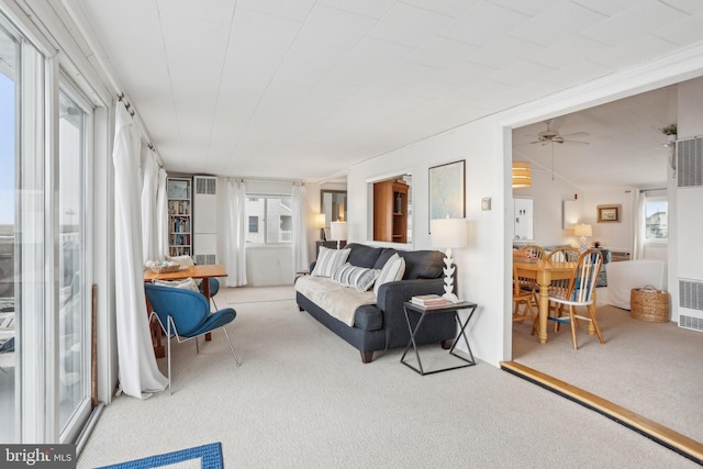 398 Kingfisher Rd, Tuckerton, NJ 08087 - carpeted living area with a heating unit and ceiling fan