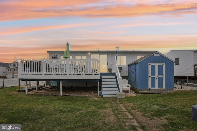 398 Kingfisher Rd, Tuckerton, NJ 08087 - back of house at dusk with a deck and stairs