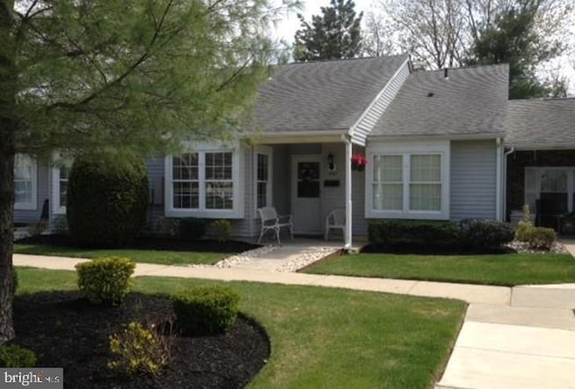 1447 Thornwood Dr, Mount Laurel, NJ 08054 - view of front of property featuring a front yard and a shingled roof