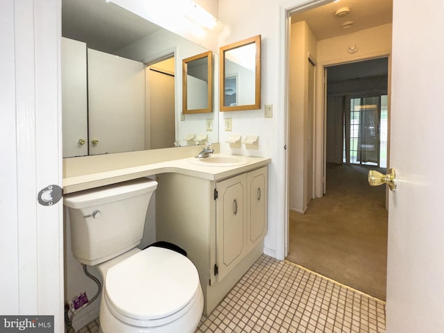 1447 Thornwood Dr, Mount Laurel, NJ 08054 - half bathroom featuring toilet, vanity, and tile patterned flooring