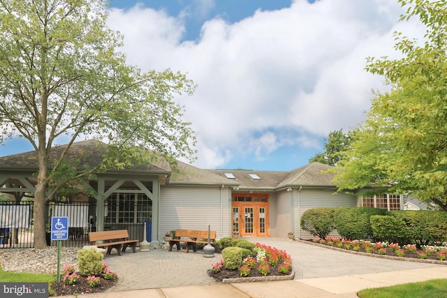 1447 Thornwood Dr, Mount Laurel, NJ 08054 - view of front of home featuring french doors, a patio area, and driveway