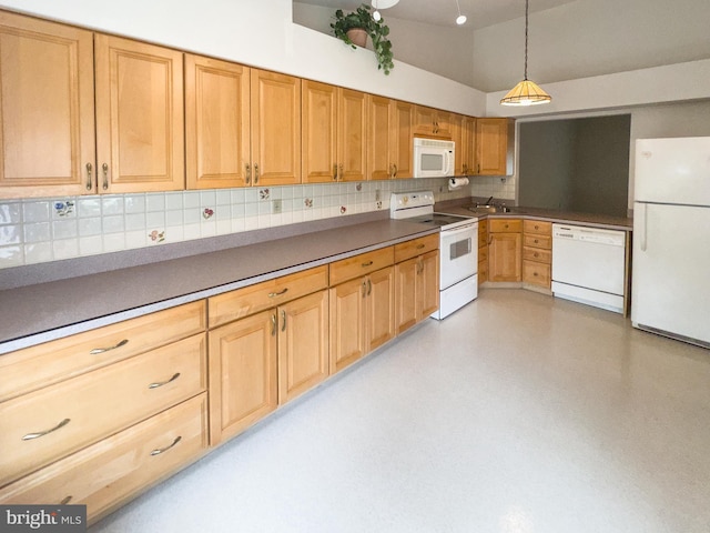 1447 Thornwood Dr, Mount Laurel, NJ 08054 - kitchen with white appliances, tasteful backsplash, a sink, pendant lighting, and dark countertops