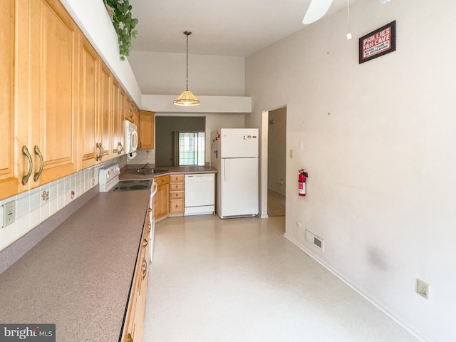 1447 Thornwood Dr, Mount Laurel, NJ 08054 - kitchen featuring white appliances, a sink, a ceiling fan, vaulted ceiling, and tasteful backsplash