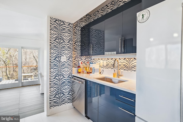 201 Nottingham Hl, Annapolis, MD 21405 - kitchen featuring freestanding refrigerator, dishwasher, a sink, and modern cabinets