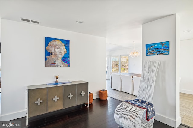 201 Nottingham Hl, Annapolis, MD 21405 - sitting room featuring wood finished floors, a chandelier, and baseboards