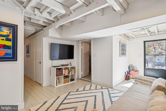 201 Nottingham Hl, Annapolis, MD 21405 - living room with wood finished floors, beamed ceiling, and baseboards