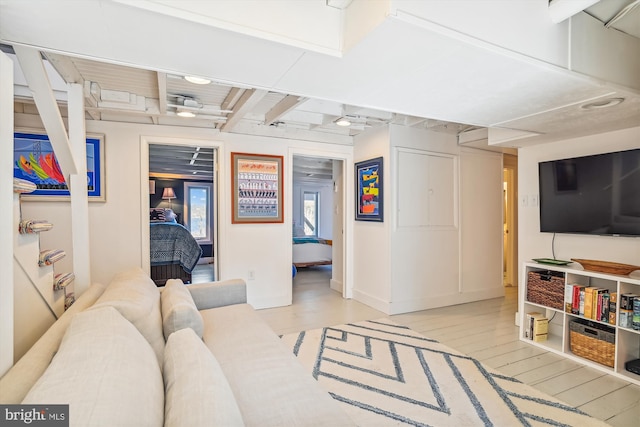 201 Nottingham Hl, Annapolis, MD 21405 - living area featuring light wood finished floors and beam ceiling