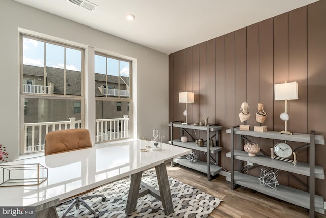 office space with wood finished floors and recessed lighting