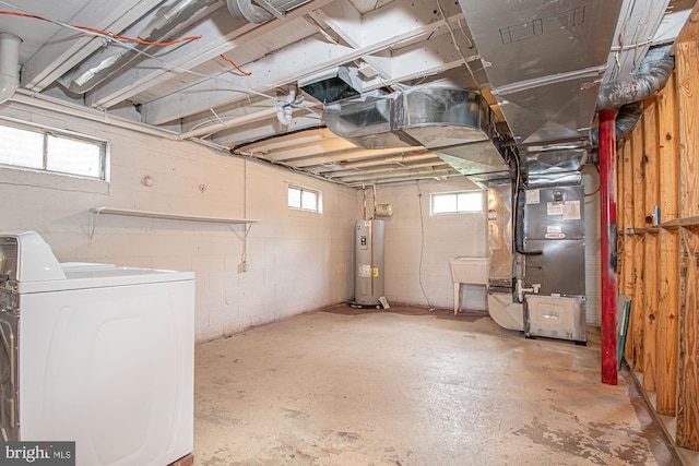 126 Clymer Ave, Front Royal, VA 22630 - basement with washer / dryer, water heater, heating unit, a sink, and concrete block wall