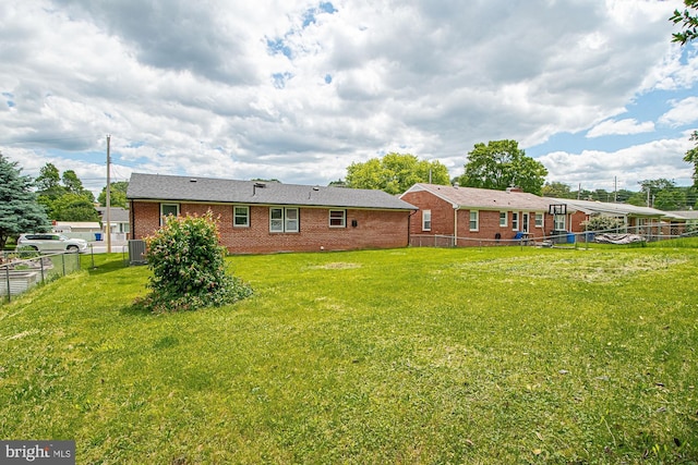 126 Clymer Ave, Front Royal, VA 22630 - rear view of house with central AC unit and brick siding