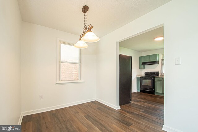 126 Clymer Ave, Front Royal, VA 22630 - unfurnished dining area featuring dark wood finished floors and baseboards