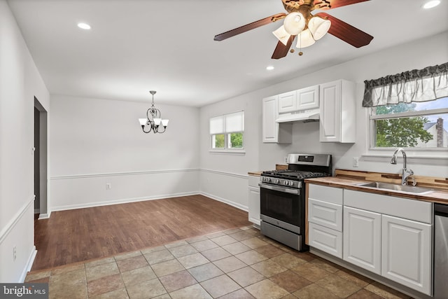 12 Constitution Rd, Clementon, NJ 08021 - kitchen featuring stainless steel appliances, a sink, under cabinet range hood, white cabinetry, and recessed lighting