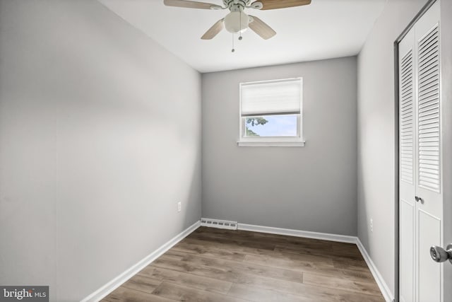 12 Constitution Rd, Clementon, NJ 08021 - unfurnished bedroom with a closet, wood finished floors, baseboards, and a ceiling fan