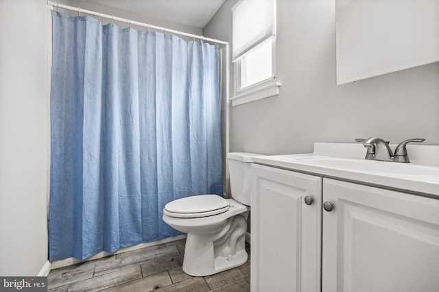 12 Constitution Rd, Clementon, NJ 08021 - bathroom featuring vanity, toilet, wood tiled floors, and a shower with shower curtain