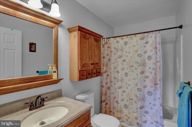 3919 Penns Dr, Reading, PA 19606 - bathroom featuring toilet, vanity, and shower / bath combo with shower curtain