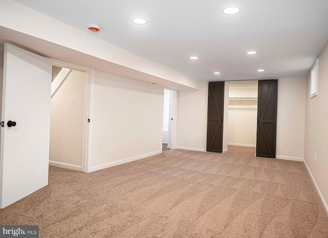 803 Essex Ave, Essex, MD 21221 - finished below grade area with recessed lighting, light carpet, and baseboards