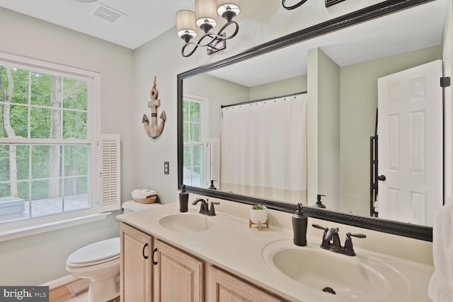 310 Owings Hill Ct, Owings, MD 20736 - bathroom featuring toilet, double vanity, a chandelier, baseboards, and a shower with curtain