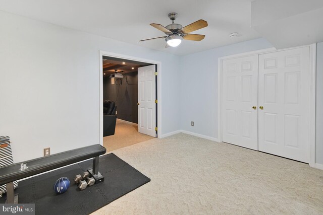310 Owings Hill Ct, Owings, MD 20736 - exercise area with a ceiling fan, carpet, and baseboards