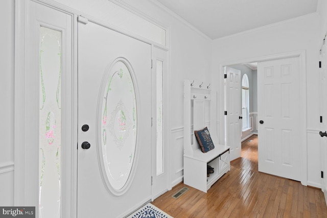 310 Owings Hill Ct, Owings, MD 20736 - entryway featuring light wood finished floors and ornamental molding