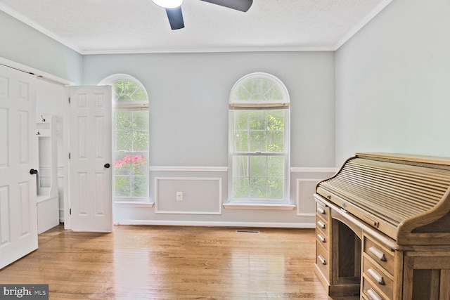 310 Owings Hill Ct, Owings, MD 20736 - sitting room featuring ornamental molding, ceiling fan, wood finished floors, and a wainscoted wall