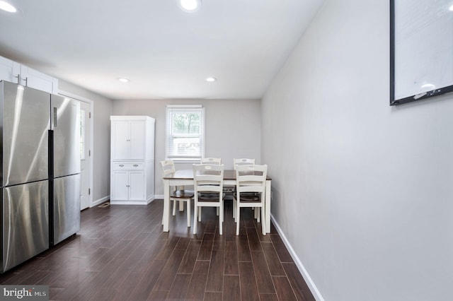 13713 Mayfair Ct, Woodbridge, VA 22193 - dining space with dark wood-type flooring and recessed lighting