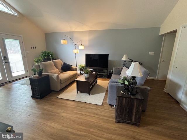 21 Moby Dick Dr, Ocean Pines, MD 21811 - living room featuring vaulted ceiling and wood finished floors