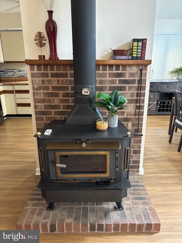 21 Moby Dick Dr, Ocean Pines, MD 21811 - detailed view of wood finished floors and a wood stove
