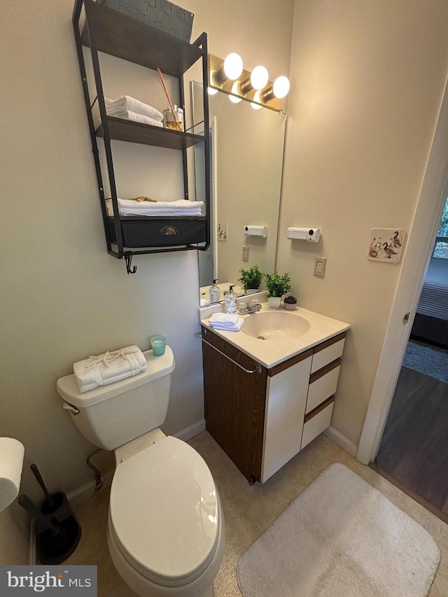 21 Moby Dick Dr, Ocean Pines, MD 21811 - half bathroom with toilet, vanity, and baseboards