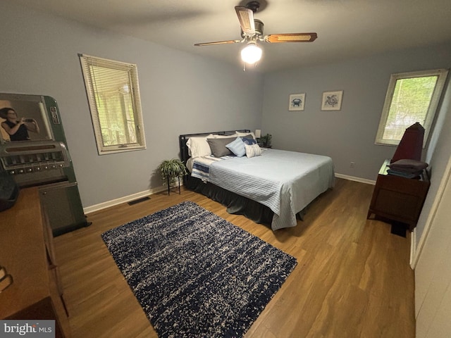 21 Moby Dick Dr, Ocean Pines, MD 21811 - bedroom with wood finished floors, baseboards, and a ceiling fan