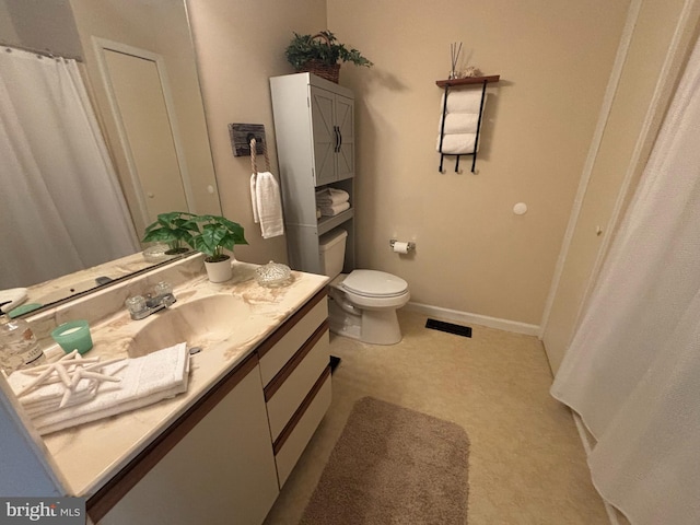 21 Moby Dick Dr, Ocean Pines, MD 21811 - bathroom featuring vanity, toilet, baseboards, curtained shower, and tile patterned floors