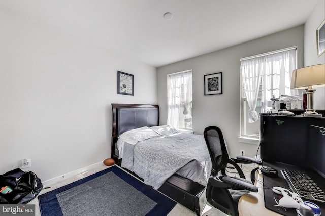 613 Percy Pl # B, Manassas Park, VA 20111 - bedroom featuring a desk, carpet flooring, and baseboards