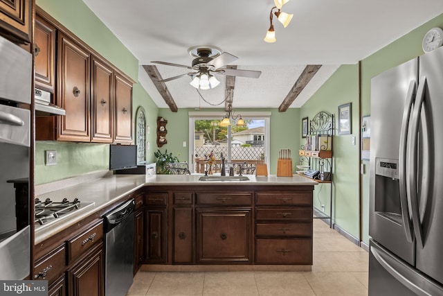 24 Holyoke Dr, Delran, NJ 08075 - kitchen with stainless steel appliances, a sink, ceiling fan, a peninsula, and light countertops