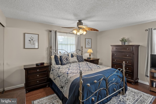 24 Holyoke Dr, Delran, NJ 08075 - bedroom featuring dark wood-style flooring, a textured ceiling, baseboards, and ceiling fan