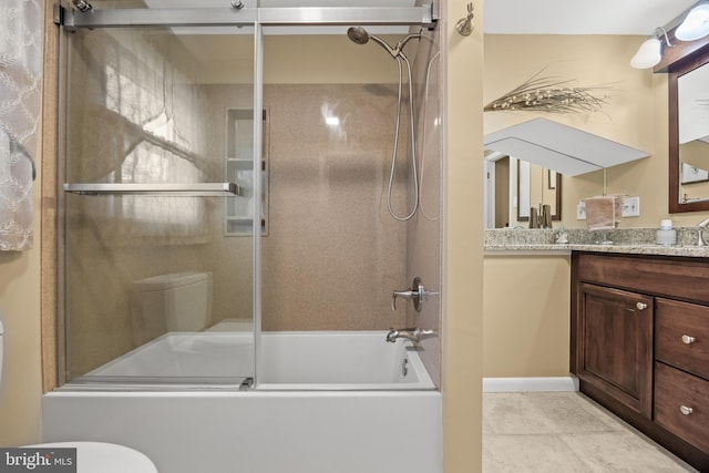 24 Holyoke Dr, Delran, NJ 08075 - bathroom featuring combined bath / shower with glass door, vanity, toilet, tile patterned flooring, and baseboards