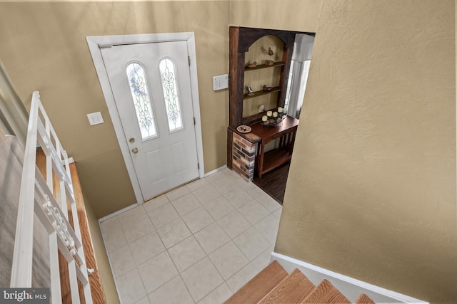 24 Holyoke Dr, Delran, NJ 08075 - foyer featuring stairway, light tile patterned flooring, baseboards, and a textured wall