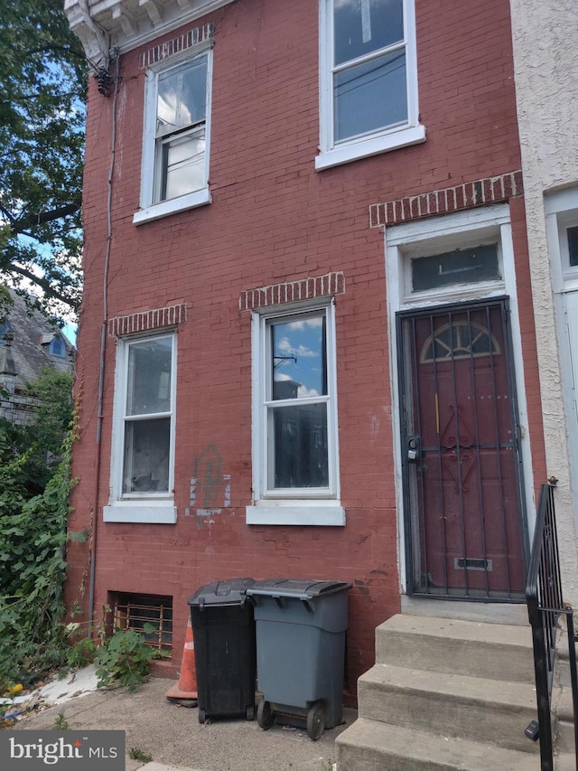 1302 N 25th St, Philadelphia, PA 19121 - property entrance with brick siding