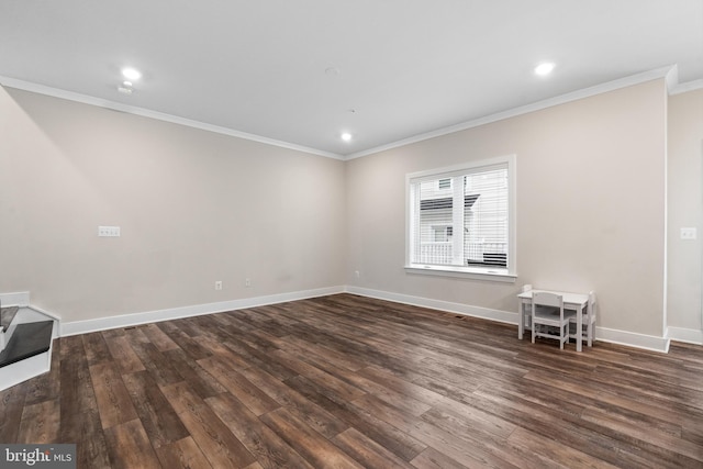 15590 Grade Line Pl, Woodbridge, VA 22191 - empty room featuring crown molding, dark wood-style floors, baseboards, and recessed lighting