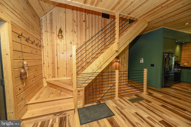 1067 N Camp Rd, Mc Henry, MD 21541 - stairway featuring wooden ceiling, wood finished floors, and wood walls