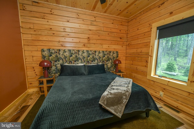 1067 N Camp Rd, Mc Henry, MD 21541 - bedroom featuring wood ceiling, wood walls, and baseboards