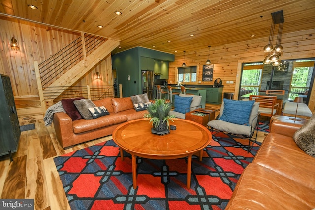 1067 N Camp Rd, Mc Henry, MD 21541 - living room with wooden walls, stairway, wood finished floors, wooden ceiling, and recessed lighting