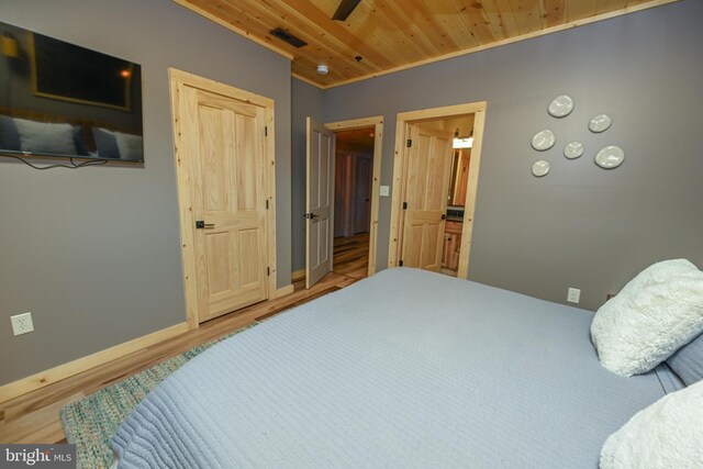 1067 N Camp Rd, Mc Henry, MD 21541 - bedroom featuring wooden ceiling, wood finished floors, and baseboards