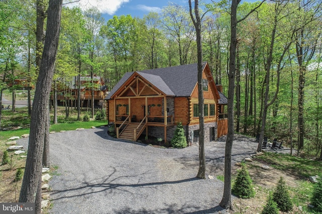 1067 N Camp Rd, Mc Henry, MD 21541 - view of front of home featuring a porch, log exterior, and a shingled roof
