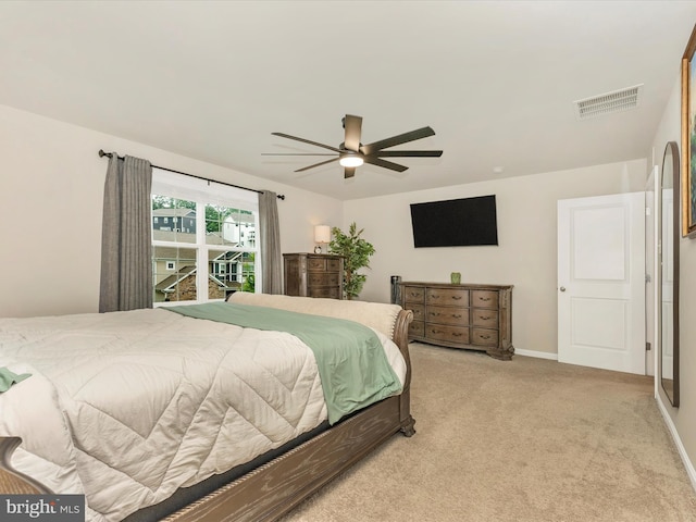 5809 Zoe Ln, Frederick, MD 21704 - bedroom featuring light carpet, baseboards, and a ceiling fan