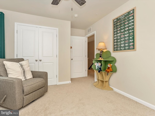 5809 Zoe Ln, Frederick, MD 21704 - living area with carpet floors, baseboards, and ceiling fan