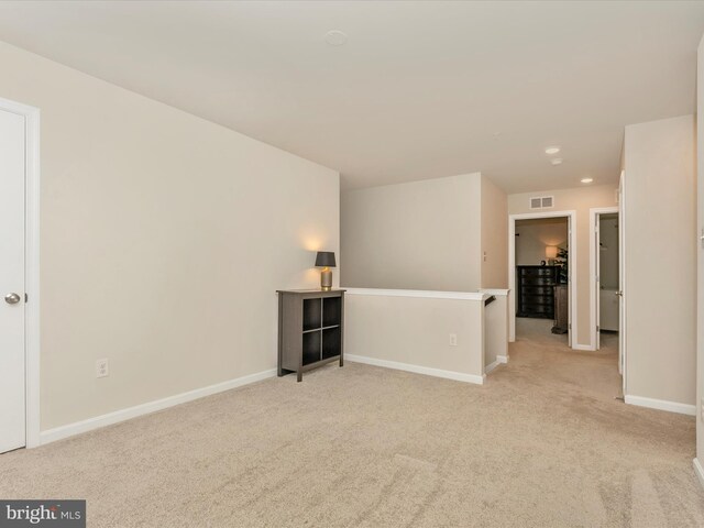 5809 Zoe Ln, Frederick, MD 21704 - spare room featuring light colored carpet, baseboards, and recessed lighting