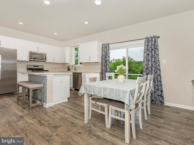 5809 Zoe Ln, Frederick, MD 21704 - dining space featuring wood finished floors, recessed lighting, and baseboards