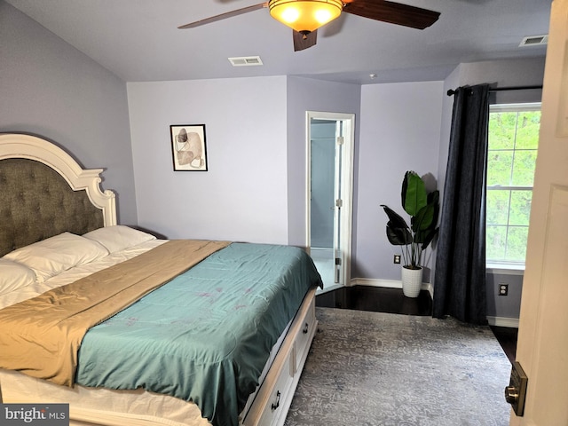 7832 Canter Ct, Severn, MD 21144 - bedroom featuring multiple windows, wood finished floors, ceiling fan, and baseboards